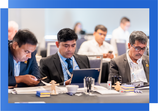 Delegates networking at AI in Oil and Gas conference, Panelists discussing machine learning applications during AI in Oil and Gas conference, Professional conversation during energy technology summit